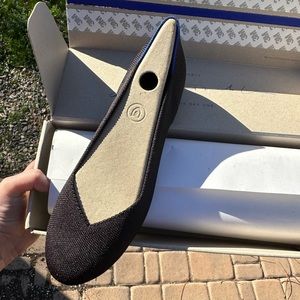 NIB classic black Rothy’s size 10